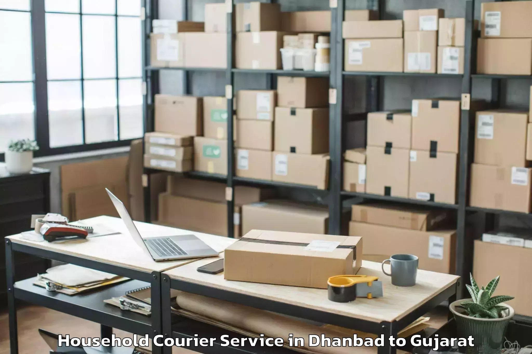 Easy Dhanbad to Dharmsinh Desai University Nad Household Courier Booking